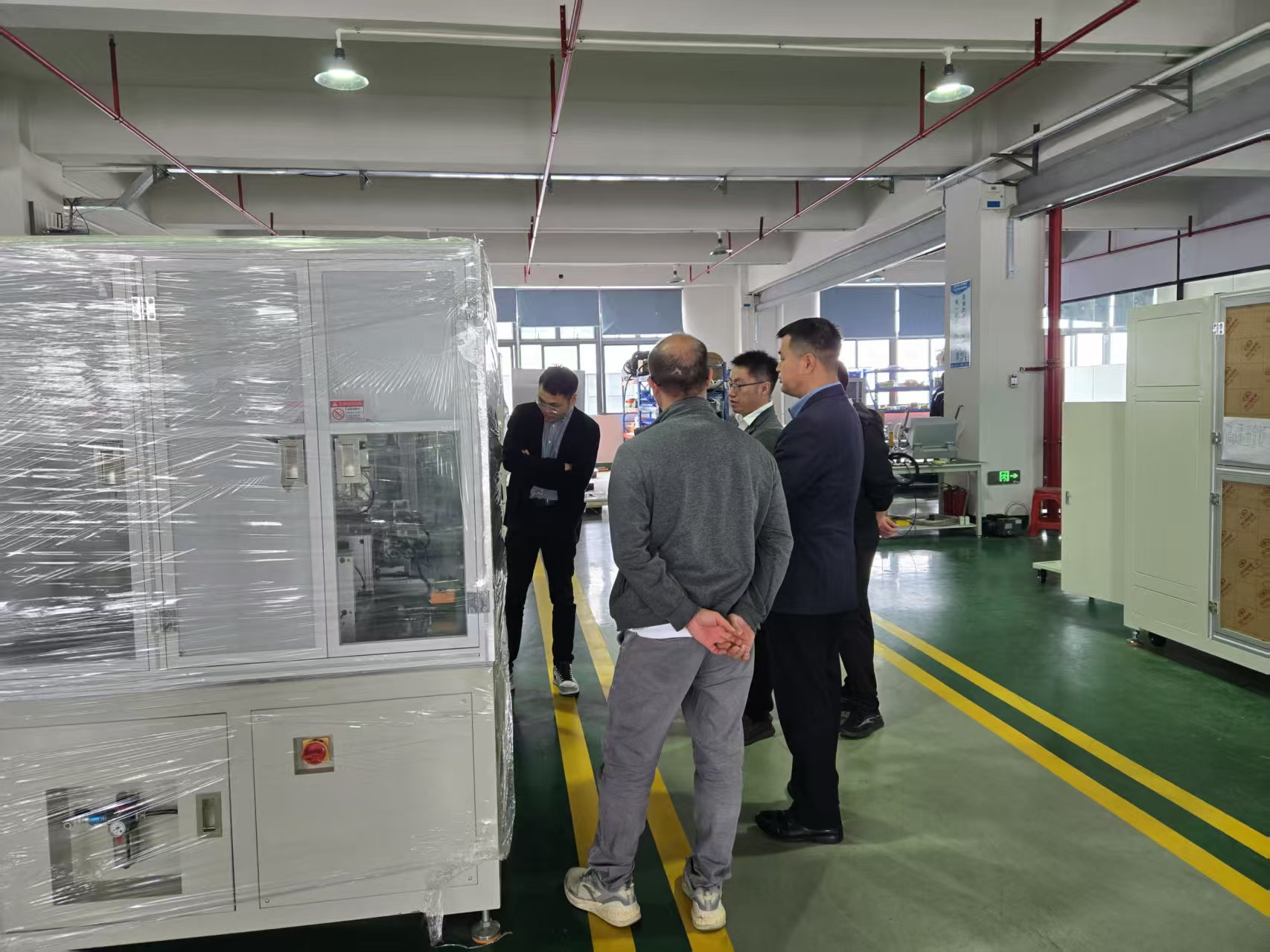 Technical discussion during factory visit